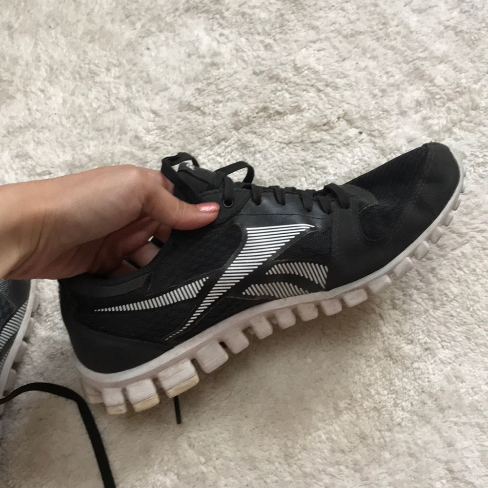 Dark grey Reebok running shoes